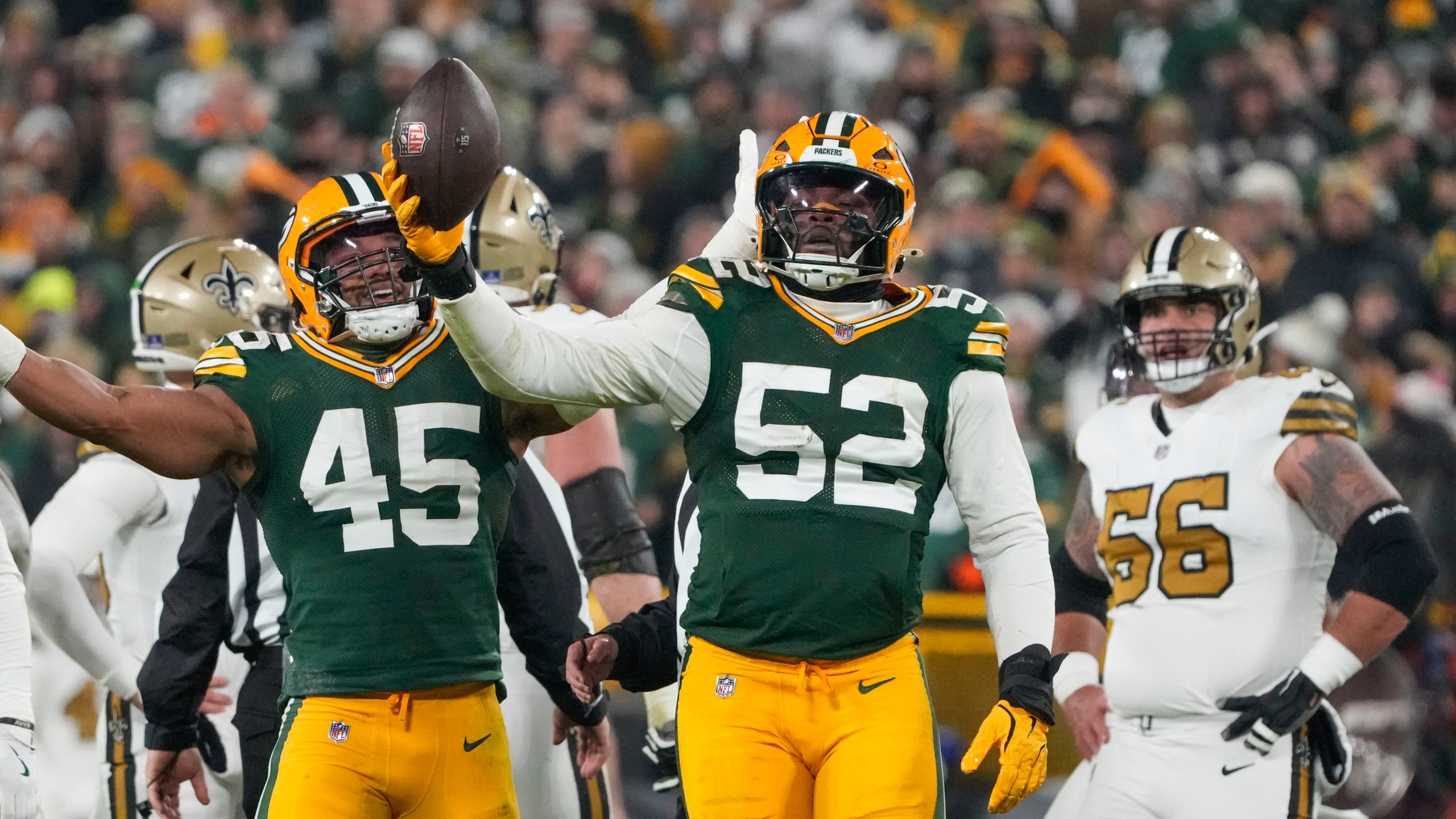 Green Bay Packers defensive end Rashan Gary (52) celebrates a fumble recovery during the first half of an NFL football game against the New Orleans Saints, Monday, Dec. 23, 2024, in Green Bay, Wis.(AP Photo/Morry Gash)