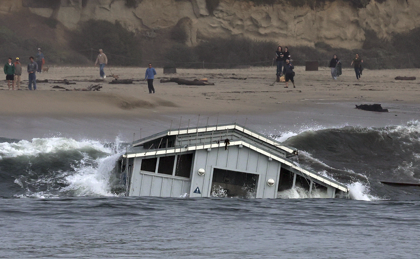 A building from a wharf collapse floats in the ocean Monday, Dec. 23, 2024, in Santa Cruz, Calif. (Shmuel Thaler/The Santa Cruz Sentinel via AP)