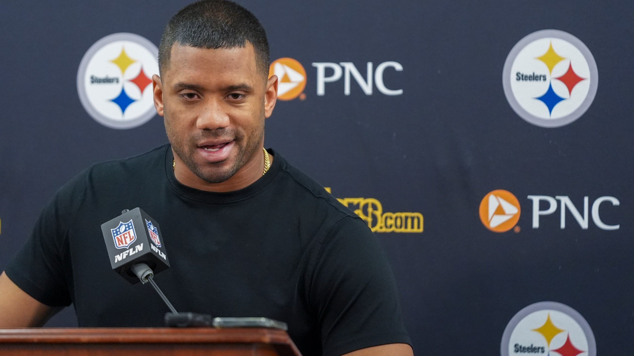 Pittsburgh Steelers quarterback Russell Wilson talks to reporters following an NFL football game against the Baltimore Ravens, Saturday, Dec. 21, 2024, in Baltimore. The Ravens won 34-17. (AP Photo/Stephanie Scarbrough)