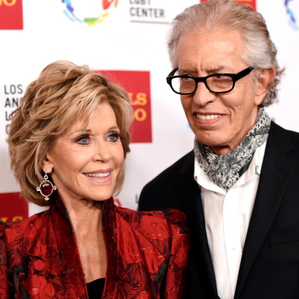 FILE - Jane Fonda, left, and Richard Perry pose for a photo at the Los Angeles LGBT Center's 46th Anniversary Gala Vanguard Awards at the Hyatt Regency Century Plaza in Los Angeles, Nov. 7, 2015. (Photo by Chris Pizzello/Invision/AP, File)