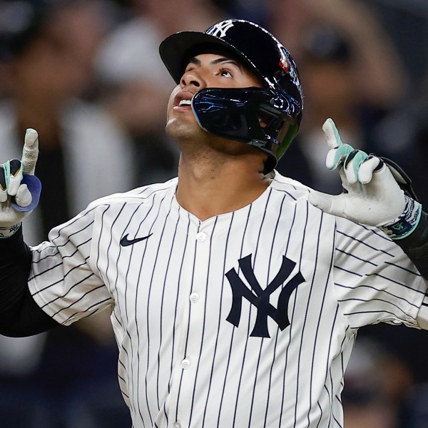 FILE - New York Yankees' Gleyber Torres reacts after hitting a two-run home run against the Kansas City Royals during the third inning Game 1 of the American League baseball division series, Saturday, Oct. 5, 2024, in New York. (AP Photo/Adam Hunger, File)