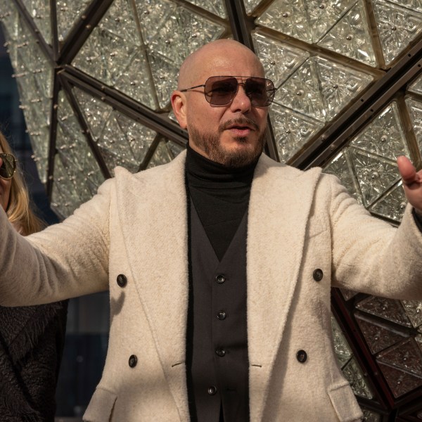 Singer Pitbull attends the Times Square New Year's Eve Ball Crystal Installation at One Times Square, Friday, Dec. 27, 2024, in New York. (AP Photo/Yuki Iwamura)