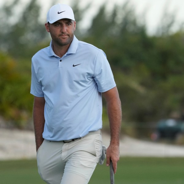 Scottie Scheffler, of the United States, reacts after missing a putt on the 18th hole during the third round of the Hero World Challenge PGA Tour at the Albany Golf Club, in New Providence, Bahamas, Saturday, Dec. 7, 2024. (AP Photo/Fernando Llano)