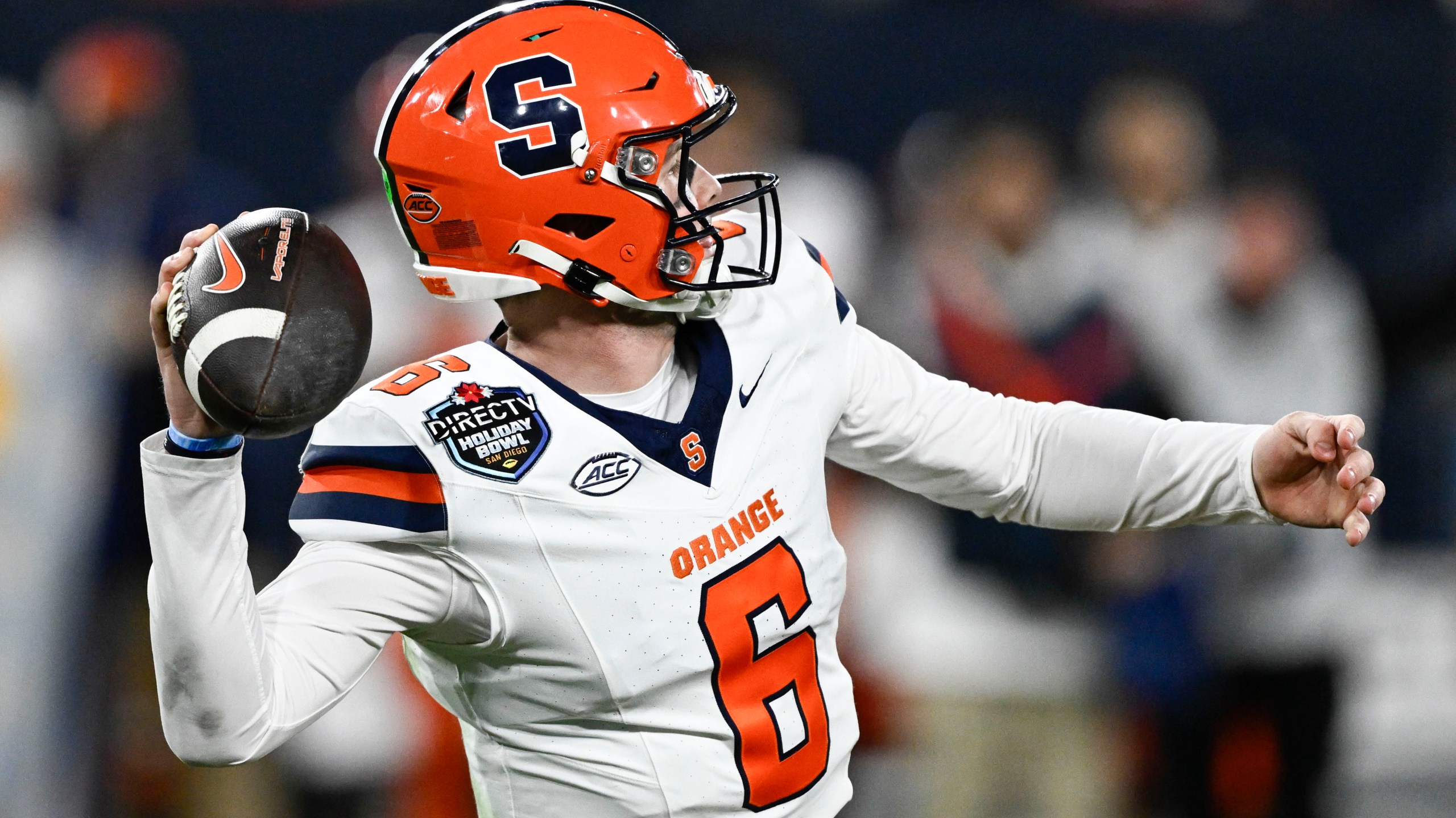 Syracuse quarterback Kyle McCord (6) passes during the first half of the Holiday Bowl NCAA college football game against Washington State Friday, Dec. 27, 2024, in San Diego. (AP Photo/Denis Poroy)