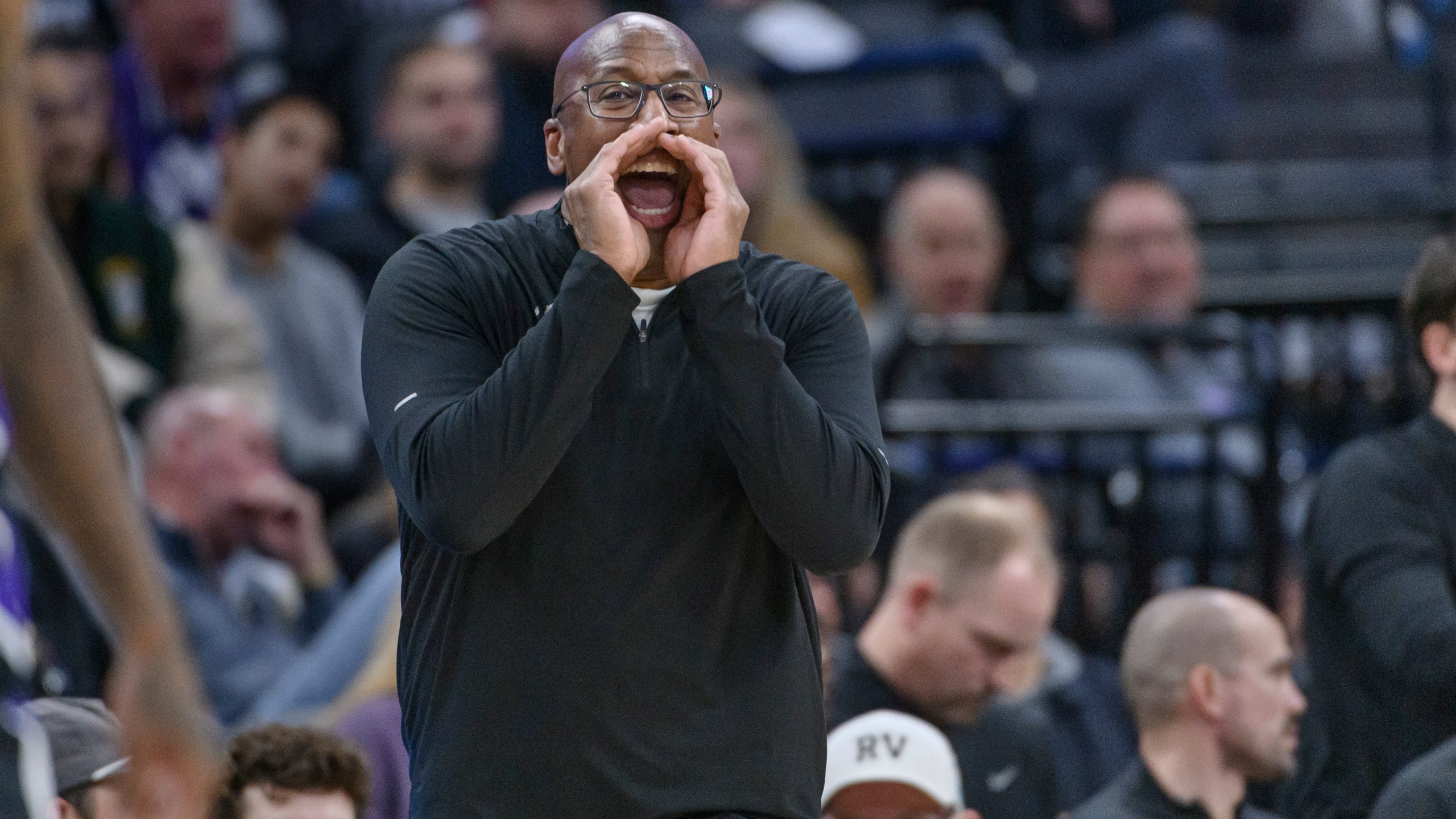 Sacramento Kings head coach Mike Brown shouts instructions from the bench during the second half of an NBA basketball game against the Denver Nuggets in Sacramento, Calif., Monday, Dec. 16, 2024. The Nuggets won 130-129. (AP Photo/Randall Benton)