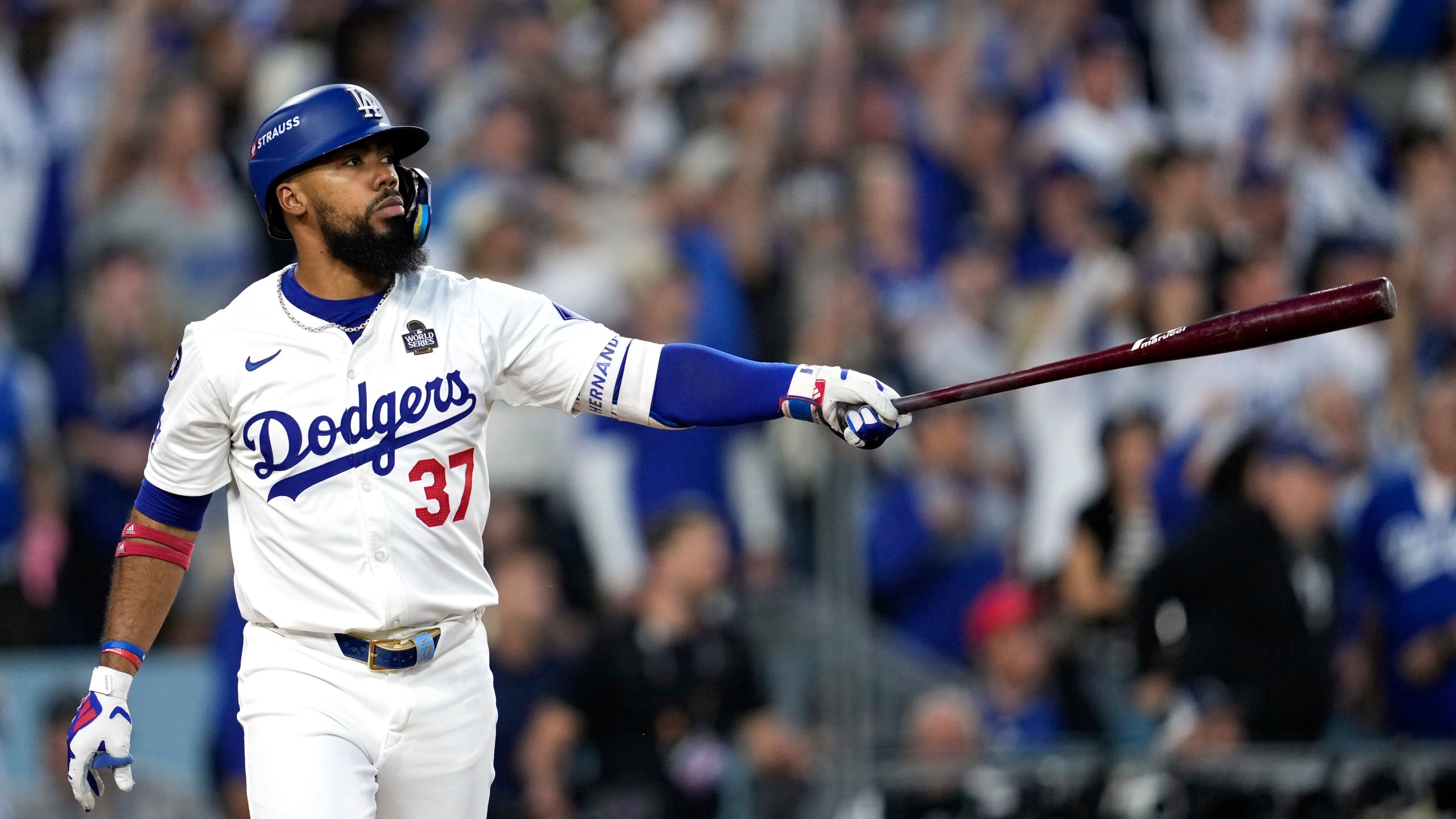 FILE - Los Angeles Dodgers' Teoscar Hernández watches his two-run home run against the New York Yankees during the third inning in Game 2 of the baseball World Series, Saturday, Oct. 26, 2024, in Los Angeles. (AP Photo/Godofredo A. Vásquez, File)