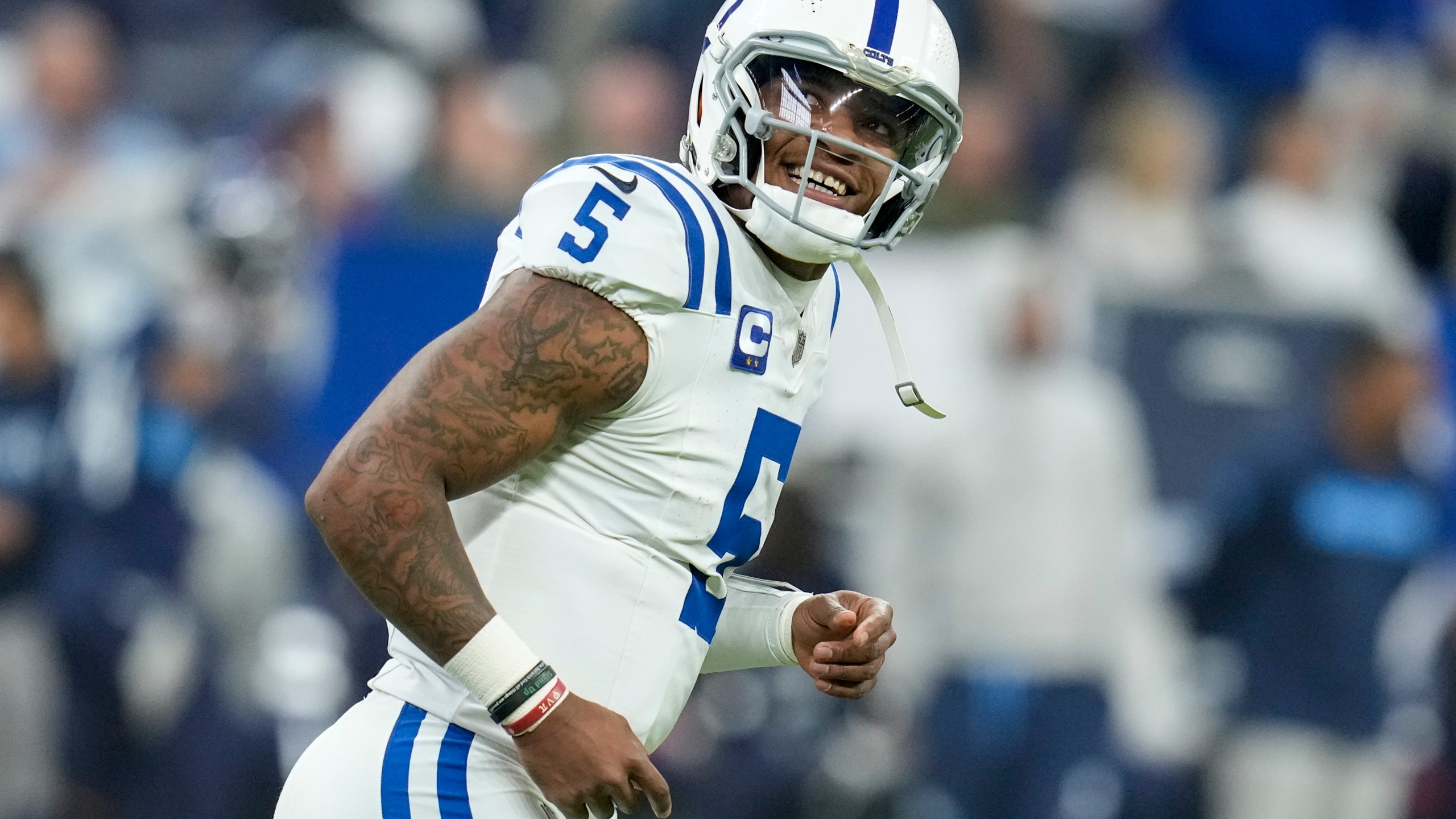 Indianapolis Colts quarterback Anthony Richardson (5) celebrates the team's touchdown during the first half of an NFL football game against the Tennessee Titans, Sunday, Dec. 22, 2024, in Indianapolis. (AP Photo/Darron Cummings)