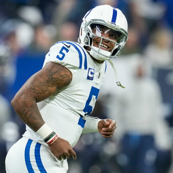 Indianapolis Colts quarterback Anthony Richardson (5) celebrates the team's touchdown during the first half of an NFL football game against the Tennessee Titans, Sunday, Dec. 22, 2024, in Indianapolis. (AP Photo/Darron Cummings)