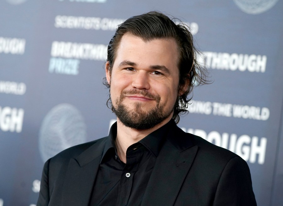 FILE - Magnus Carlsen arrives at the ninth Breakthrough Prize ceremony, April 15, 2023, at The Academy Museum of Motion Pictures in Los Angeles. (Photo by Jordan Strauss/Invision/AP, File)