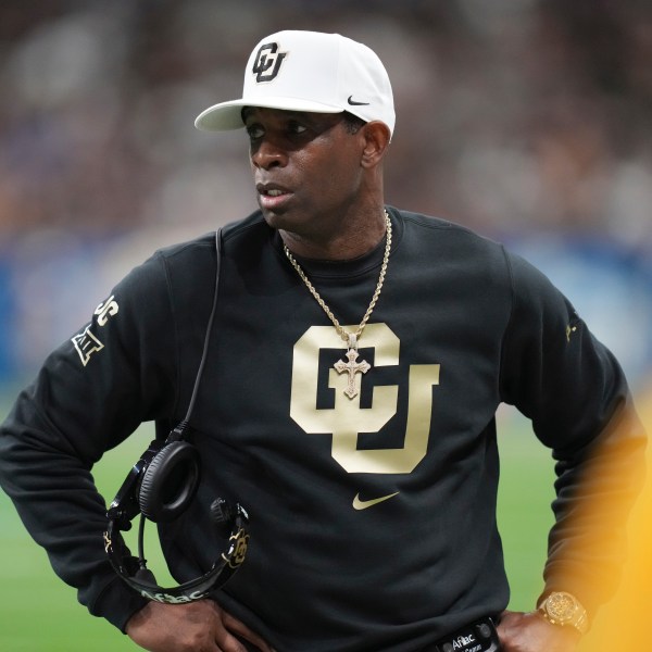 Colorado head coach Deion Sanders watches from the sideline during the first half of the Alamo Bowl NCAA college football game against BYU, Saturday, Dec. 28, 2024, in San Antonio. (AP Photo/Eric Gay)