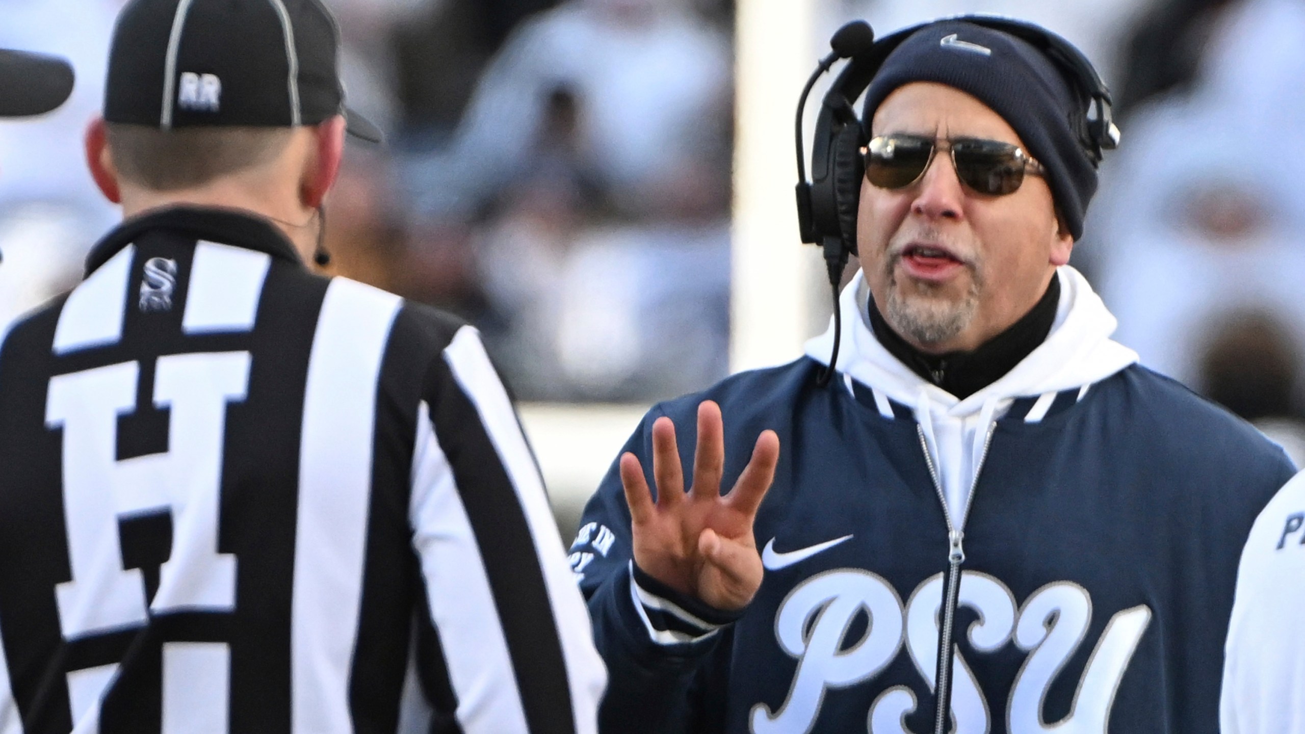 Penn State head coach James Franklin talks with an official during the second half against SMU in the first round of the College Football Playoff, Saturday, Dec. 21, 2024, in State College, Pa. (AP Photo/Barry Reeger)