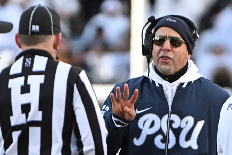 Penn State head coach James Franklin talks with an official during the second half against SMU in the first round of the College Football Playoff, Saturday, Dec. 21, 2024, in State College, Pa. (AP Photo/Barry Reeger)