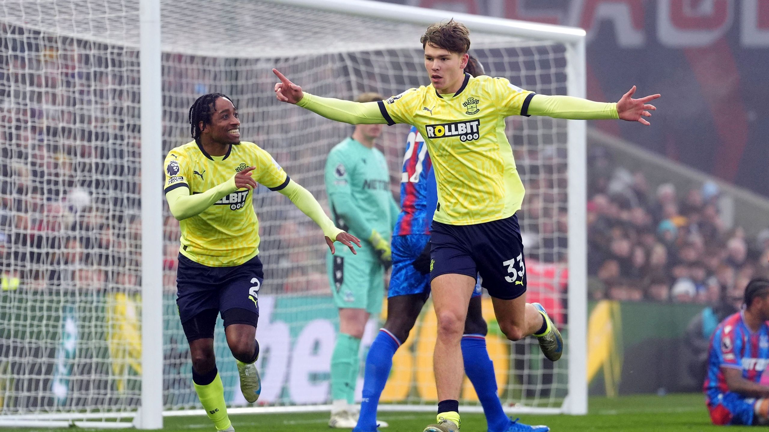 Southampton's Tyler Dibling, right, celebrates after scoring the opening goal during the English Premier League soccer match between Crystal Palace and Southampton at Selhurst Park, London, Sunday, Dec. 29, 2024. (Adam Davy/PA via AP)