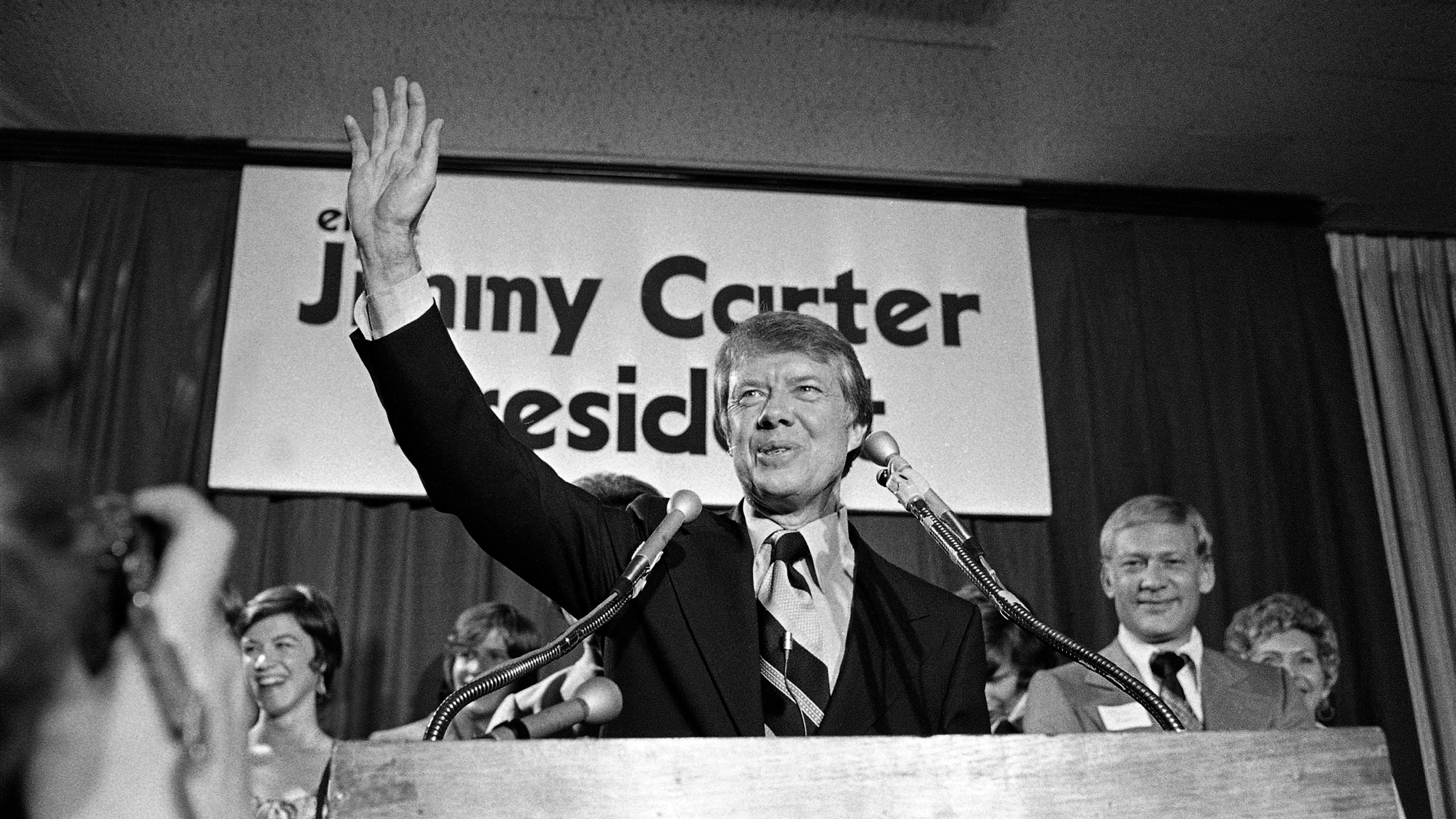 FILE - Georgia Gov. Jimmy Carter waves to a crowd gathered in Atlanta, Dec. 12, 1974, where he announced that he is a Democratic candidate for the presidency. Carter promised to "restore integrity, confidence and businesslike management to the federal government." (AP Photo, File)