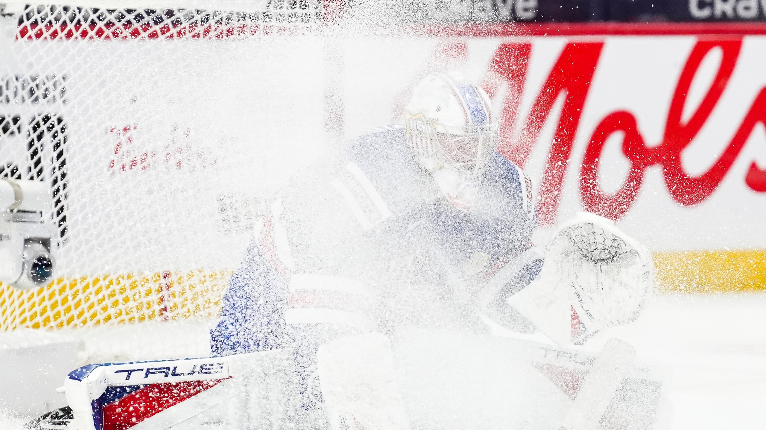 United States goaltender Trey Augustine is sprayed with ice from a skate blade while taking on Finland during second-period IIHF World Junior Hockey Championship tournament game action in Ottawa, Ontario, Sunday, Dec. 29, 2024. (Sean Kilpatrick/The Canadian Press via AP)