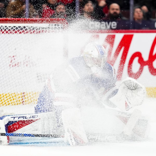 United States goaltender Trey Augustine is sprayed with ice from a skate blade while taking on Finland during second-period IIHF World Junior Hockey Championship tournament game action in Ottawa, Ontario, Sunday, Dec. 29, 2024. (Sean Kilpatrick/The Canadian Press via AP)