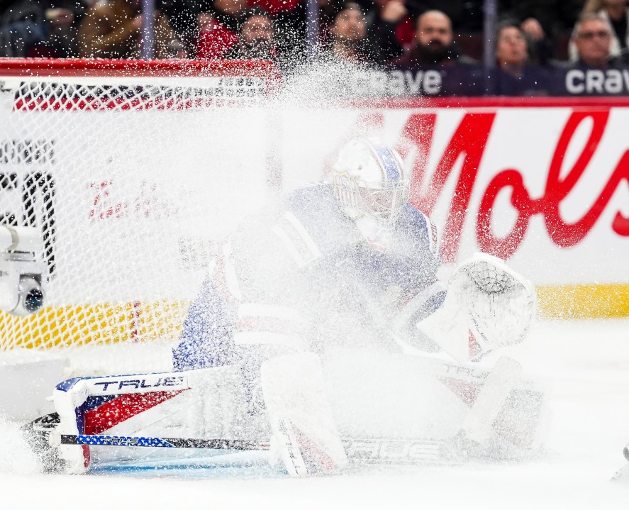 United States goaltender Trey Augustine is sprayed with ice from a skate blade while taking on Finland during second-period IIHF World Junior Hockey Championship tournament game action in Ottawa, Ontario, Sunday, Dec. 29, 2024. (Sean Kilpatrick/The Canadian Press via AP)