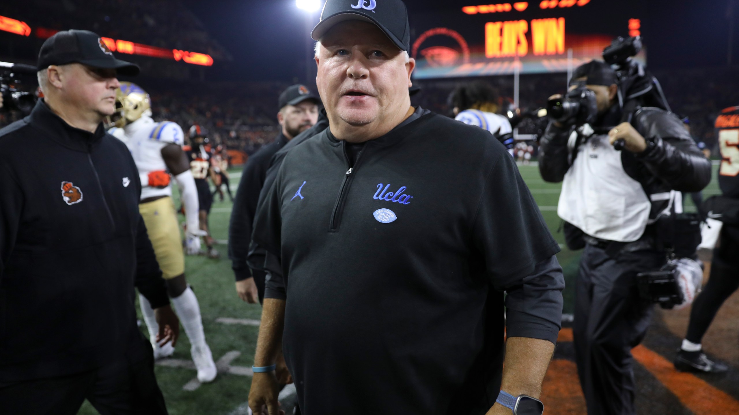 FILE - UCLA coach Chip Kelly walks off the field following the team's NCAA college football game against Oregon State, Oct. 14, 2023, in Corvallis, Ore. (AP Photo/Amanda Loman, File)