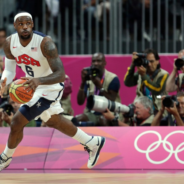 FILE - United States' Lebron James looks up the court during the first half of a preliminary men's basketball game against France at the 2012 Summer Olympics, on July 29, 2012, in London. (AP Photo/Charles Krupa, File)