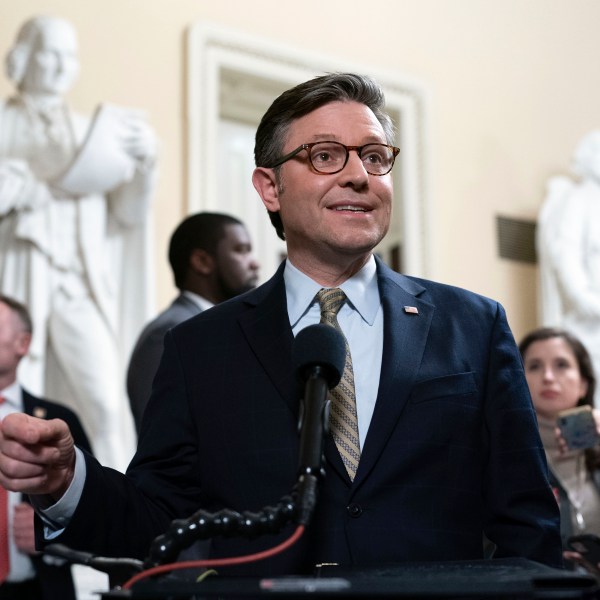 Speaker of the House Mike Johnson, R-La., talks to reporters after passing the funding bill to avert the government shutdown at the Capitol in Washington, Friday, Dec. 20, 2024. (AP Photo/Jose Luis Magana)