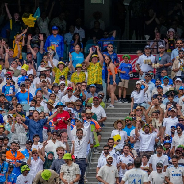 FILE - The crowd reacts after Australia's Sam Konstas hits a six during play on the first day of the fourth cricket test between Australia and India at the Melbourne Cricket Ground, Melbourne, Australia, Thursday, Dec. 26, 2024. (AP Photo/Asanka Brendon Ratnayake, file)