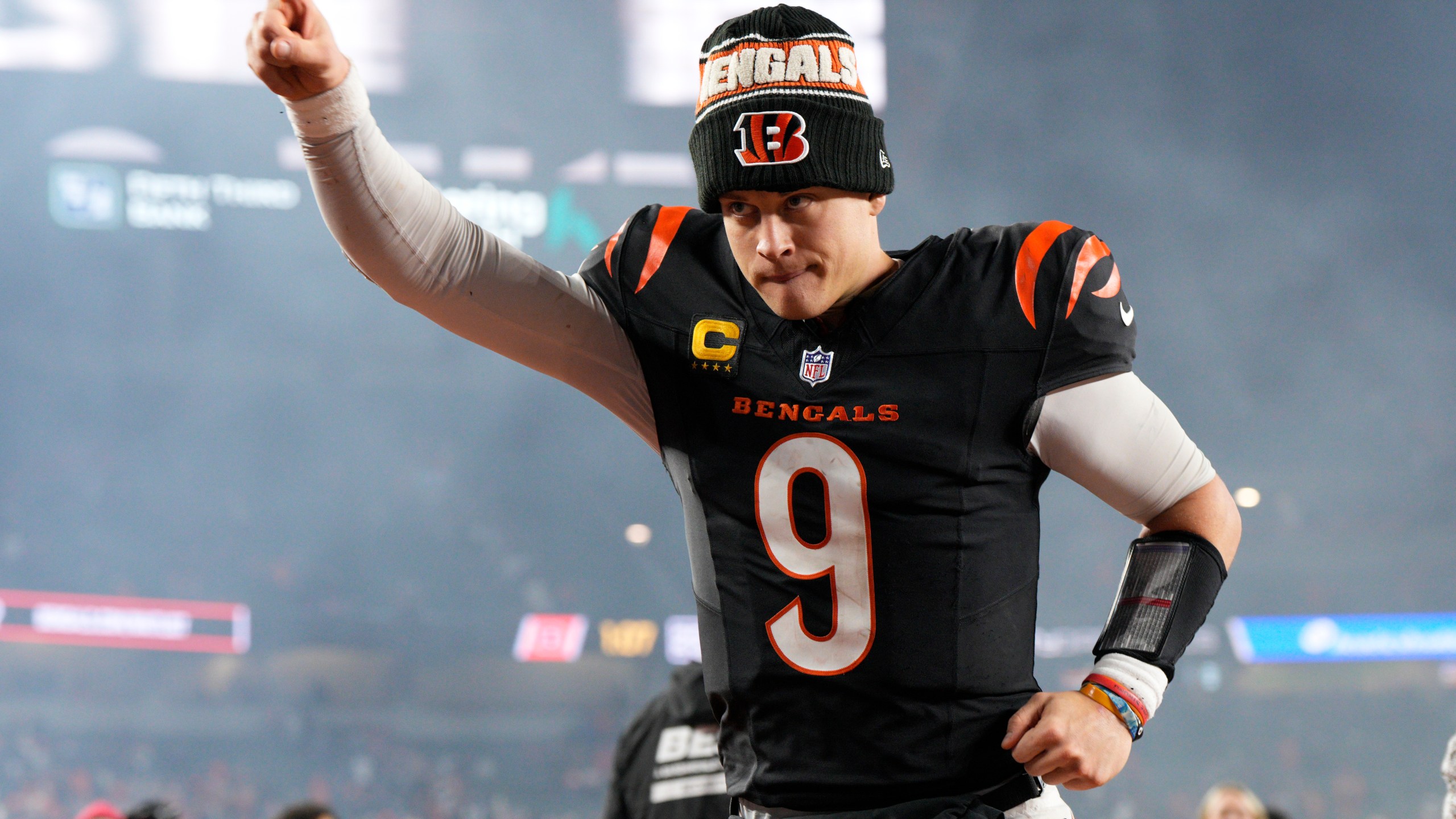 Cincinnati Bengals quarterback Joe Burrow (9) celebrates after an NFL football game against the Denver Broncos in Cincinnati, Saturday, Dec. 28, 2024. (AP Photo/Jeff Dean)