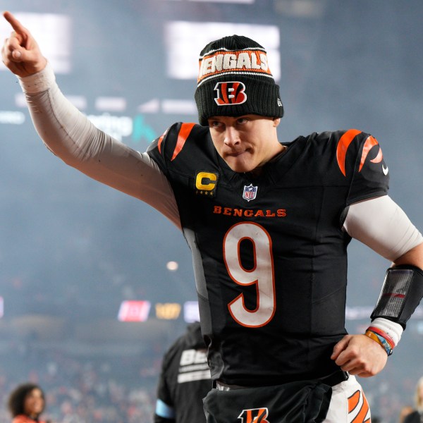 Cincinnati Bengals quarterback Joe Burrow (9) celebrates after an NFL football game against the Denver Broncos in Cincinnati, Saturday, Dec. 28, 2024. (AP Photo/Jeff Dean)