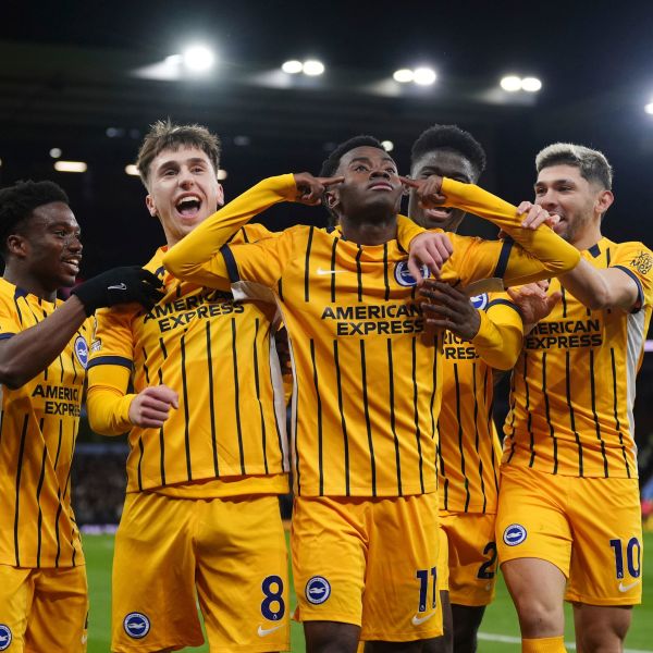 Brighton and Hove Albion's Simon Adingra celebrates scoring with teammates during the English Premier League soccer match between Aston Villa and Brighton and Hove Albion at Villa Park, Birmingham, England, Monday Dec. 30, 2024. (Bradley Collyer/PA via AP)