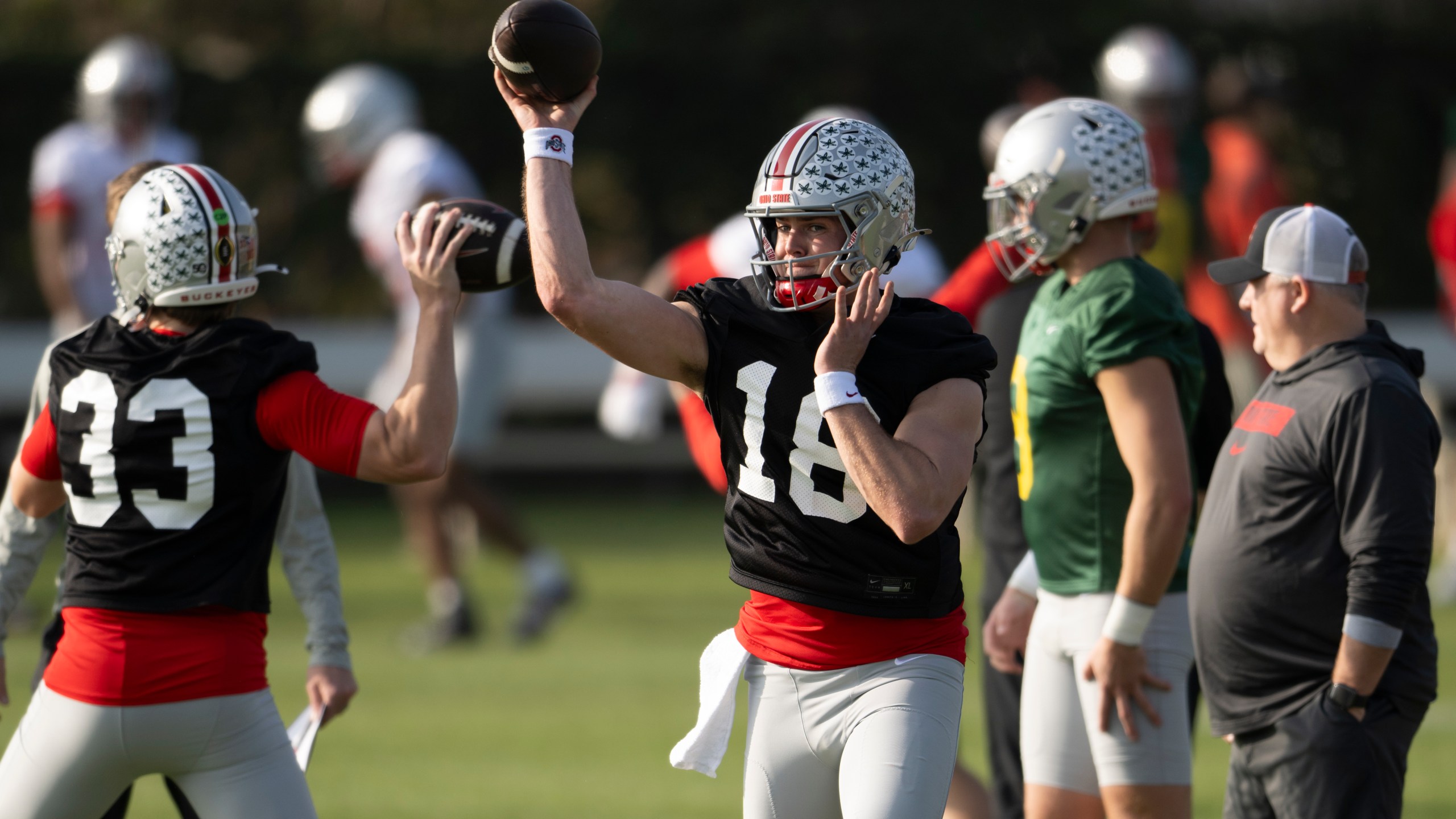 Ohio State quarterback Will Howard (18) throws during practice in Carson, Calif., Monday, Dec. 30, 2024, ahead of Wednesday's Rose Bowl College Football Playoff against Oregon. (AP Photo/Kyusung Gong)