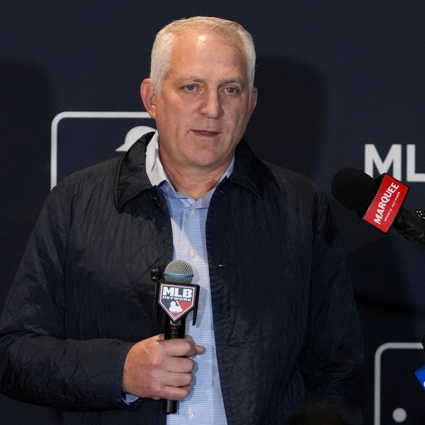 Joel Wolfe, agent for Japanese player Roki Sasaki, speaks to reporters at the Major League Baseball winter meetings in Dallas, Tuesday, Dec. 10, 2024. (AP Photo/Tony Gutierrez)