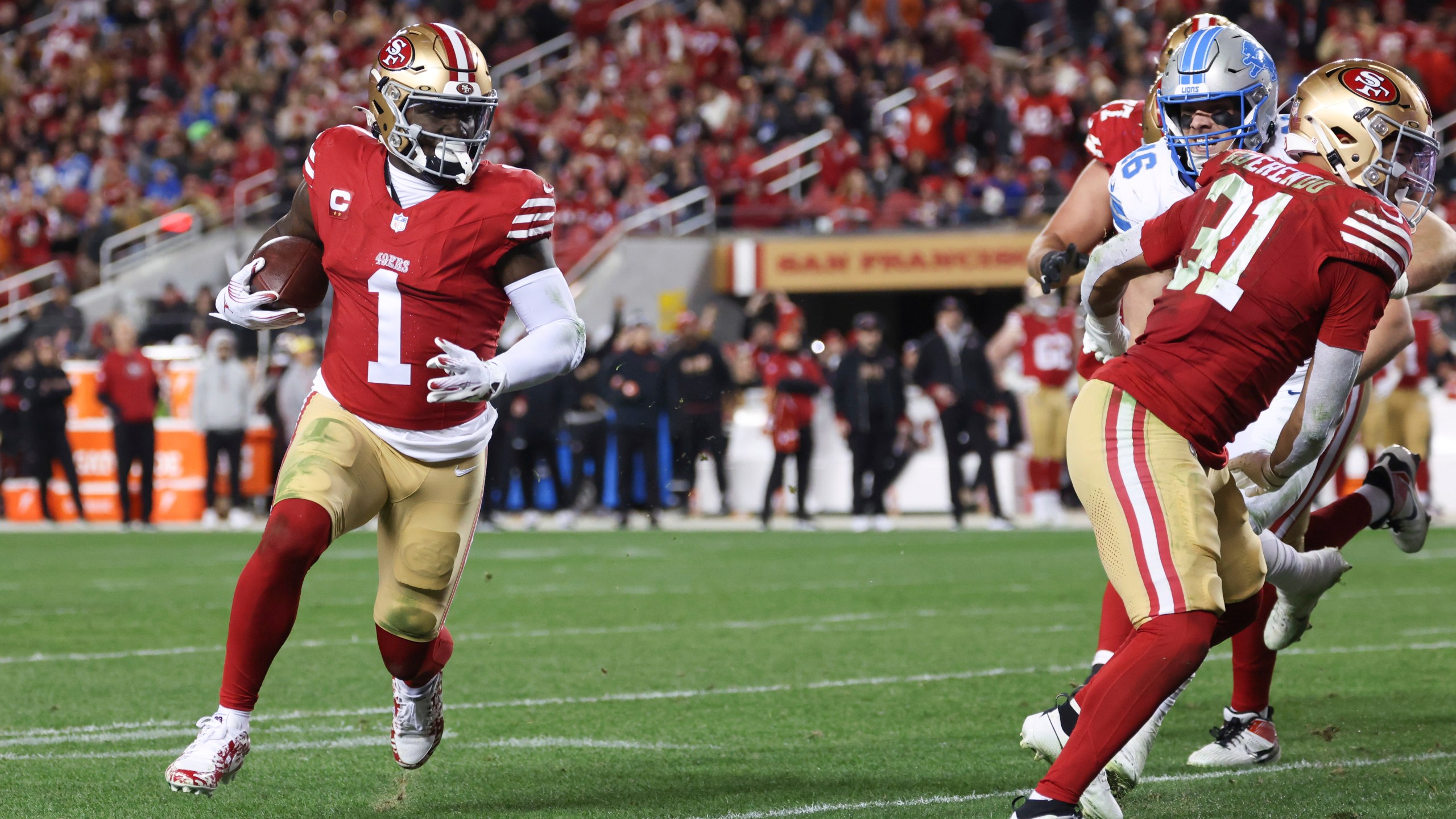 San Francisco 49ers wide receiver Deebo Samuel Sr. (1) scores a touchdown during the second half of an NFL football game against the Detroit Lions, Monday, Dec. 30, 2024, in Santa Clara, Calif. (AP Photo/Jed Jacobsohn)