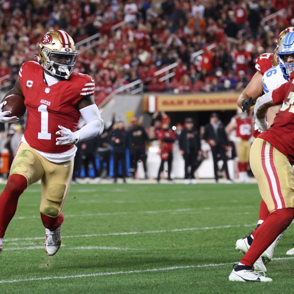 San Francisco 49ers wide receiver Deebo Samuel Sr. (1) scores a touchdown during the second half of an NFL football game against the Detroit Lions, Monday, Dec. 30, 2024, in Santa Clara, Calif. (AP Photo/Jed Jacobsohn)