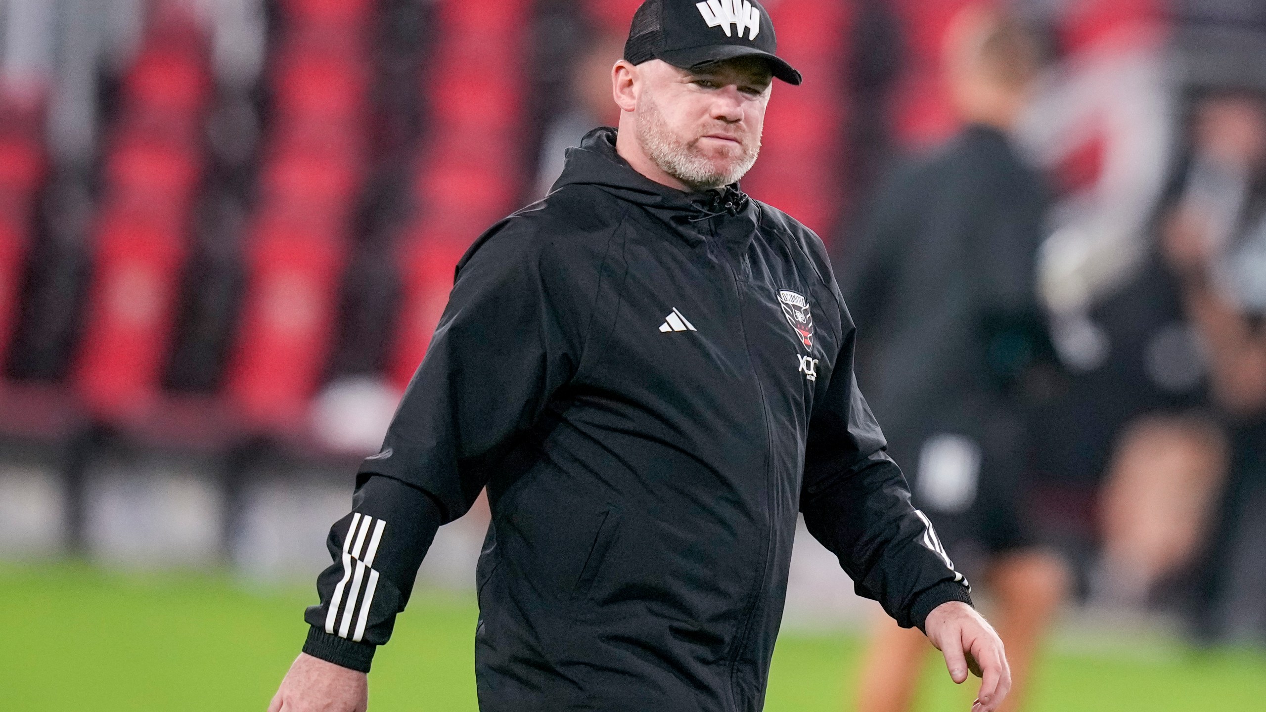 FILE - Then D.C. United head coach Wayne Rooney walks off the field after the team's MLS soccer match against Inter Miami, July 8, 2023, in Washington. (AP Photo/Alex Brandon, File)