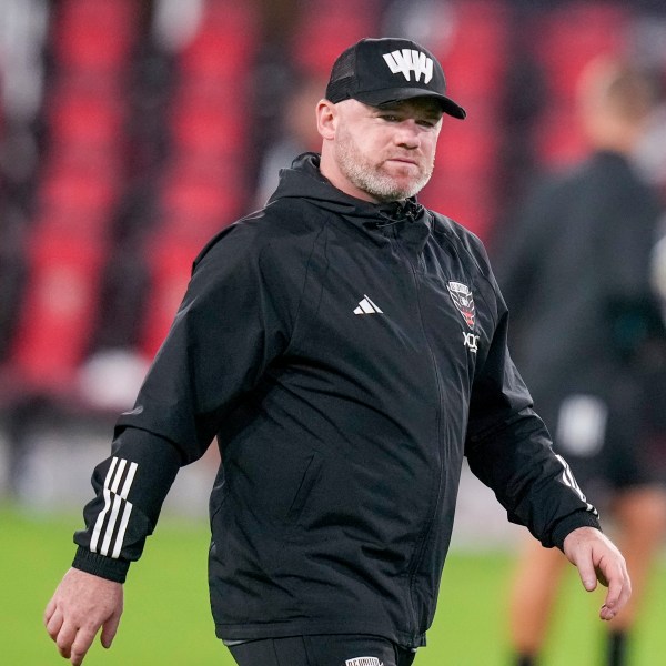 FILE - Then D.C. United head coach Wayne Rooney walks off the field after the team's MLS soccer match against Inter Miami, July 8, 2023, in Washington. (AP Photo/Alex Brandon, File)