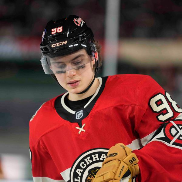 Chicago Blackhawks center Connor Bedard reacts as the St. Louis Blues score during the second period of the NHL Winter Classic outdoor hockey game at Wrigley Field, Tuesday, Dec. 31, 2024, in Chicago. (AP Photo/Erin Hooley)