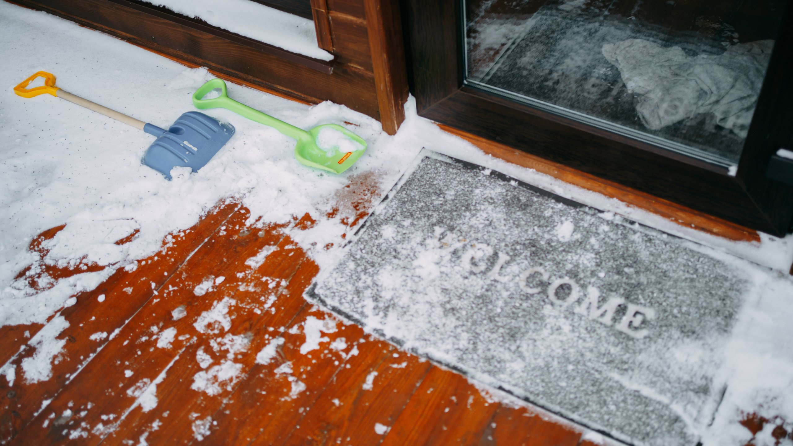 glass door threshold snow shovel wooden floor country cottage