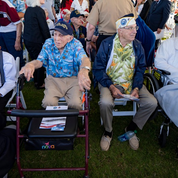 FILE - From left, Pearl Harbor survivors Harry Chandler, Ken Stevens, Herb Elfring and Ira "Ike" Schab during the 82nd Pearl Harbor Remembrance Day ceremony on Dec. 7, 2023, at Pearl Harbor in Honolulu. (AP Photo/Mengshin Lin, File)