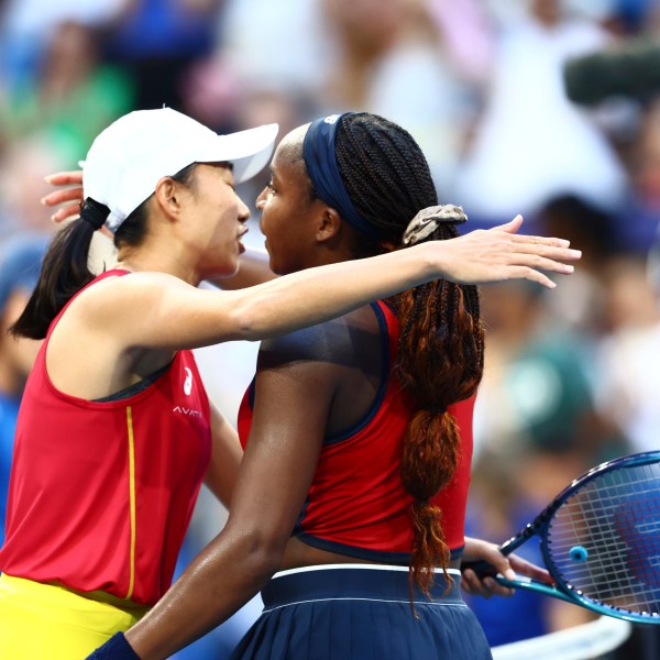 Coco Gauff of the United States, right, after defeating Shuai Zhang of China in their United Cup tennis match in Perth, Australia, Wednesday, Jan. 1, 2025. (AP Photo/Trevor Collens)