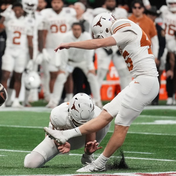 Texas; Bert Auburn (45) misses a field goal in the closing seconds during of regulation in the quarterfinals of a College Football Playoff game against Arizona State, Wednesday, Jan. 1, 2025, in Atlanta. (AP Photo/Brynn Anderson)