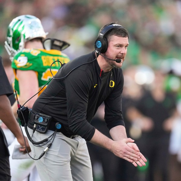 Oregon head coach Dan Lanning calls out to his players during the first half in the quarterfinals of the Rose Bowl College Football Playoff against Ohio State, Wednesday, Jan. 1, 2025, in Pasadena, Calif. (AP Photo/Mark J. Terrill)