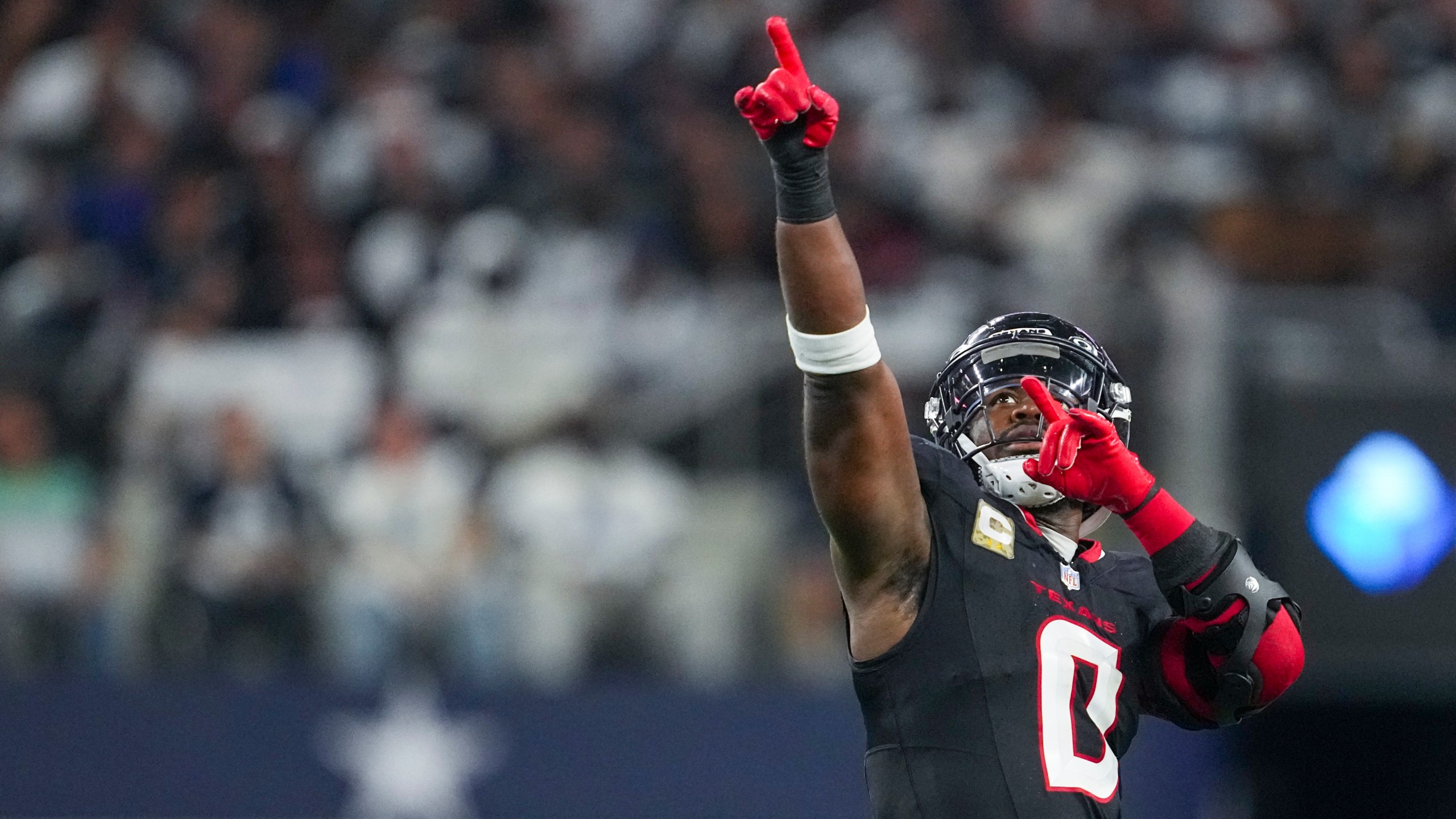 FILE - Houston Texans linebacker Azeez Al-Shaair reacts after a play against the Dallas Cowboys during the second half of an NFL football game, Nov. 18, 2024, in Arlington, Texas. (AP Photo/Tony Gutierrez, File)