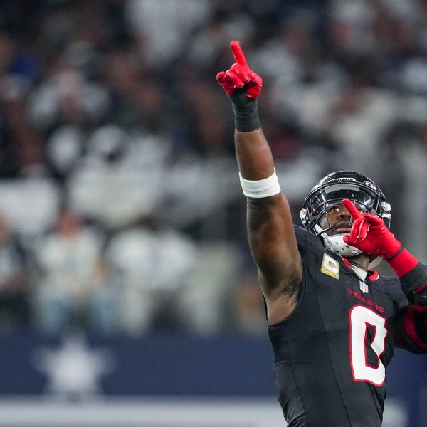 FILE - Houston Texans linebacker Azeez Al-Shaair reacts after a play against the Dallas Cowboys during the second half of an NFL football game, Nov. 18, 2024, in Arlington, Texas. (AP Photo/Tony Gutierrez, File)