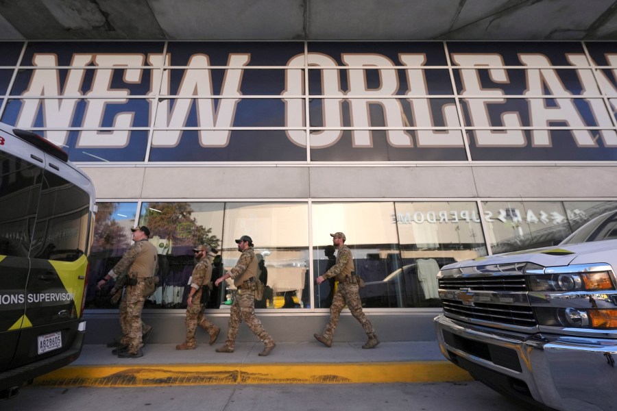 FBI SWAT team members arrive at the Superdome before the quarterfinals of a College Football Playoff between Georgia and Notre Dame, Thursday, Jan. 2, 2025, in New Orleans. (AP Photo/Gerald Herbert)