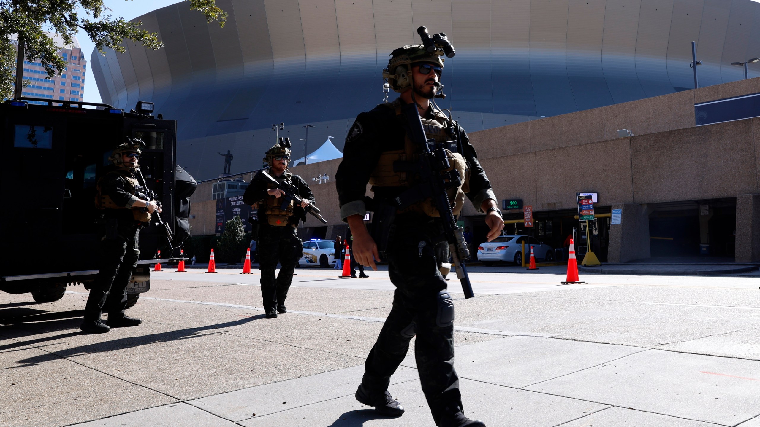 Local SWAT teams patrol outside the Caesars Superdome ahead of the Sugar Bowl NCAA College Football Playoff game, Thursday, Jan. 2, 2025, in New Orleans. (AP Photo/Butch Dill)