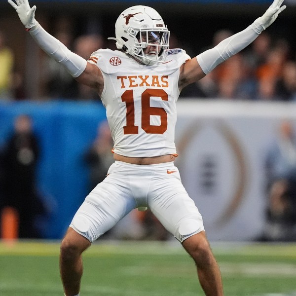 Texas defensive back Michael Taaffe (16) celebrates a play against Arizona State during the first half in the quarterfinals of a College Football Playoff, Wednesday, Jan. 1, 2025, in Atlanta. (AP Photo/Brynn Anderson)