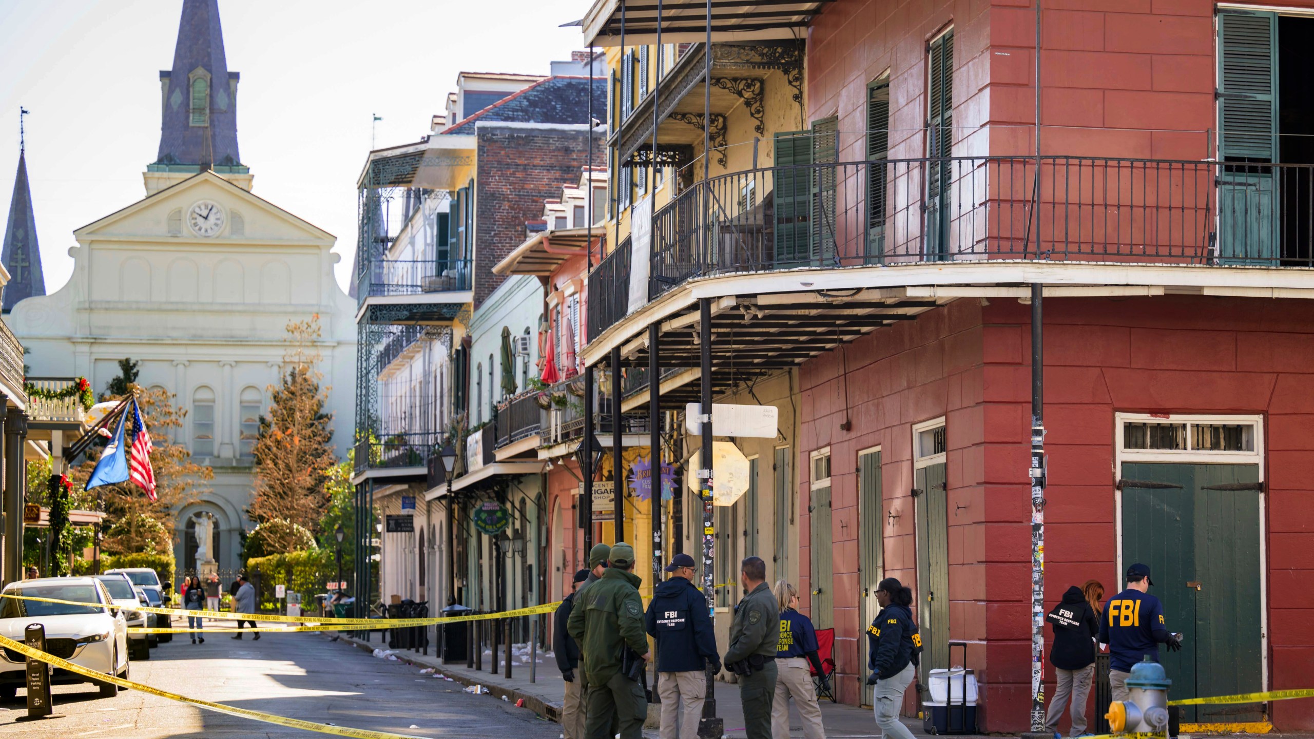 FILE - The FBI investigates the area on Orleans Street and Bourbon Street by St. Louis Cathedral in the French Quarter where a suspicious package was detonated after a person drove a truck into a crowd earlier on Bourbon Street on Wednesday, Jan. 1, 2025. (AP Photo/Matthew Hinton, File)