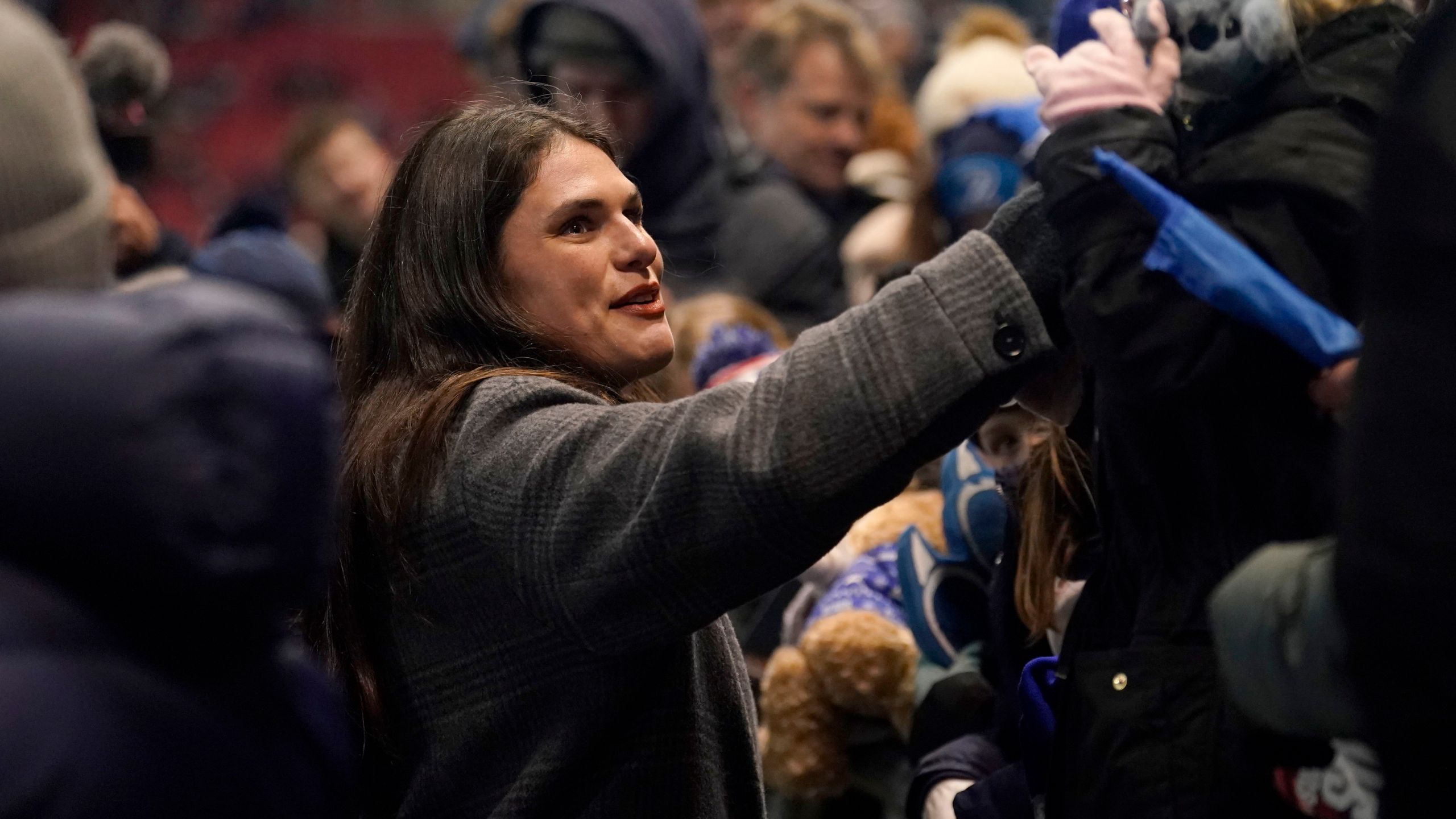 Bristol Bears' Ilona Maher greets members of the crowd at half time during the Champions Cup rugby union match at Ashton Gate, Bristol, England, Sunday Dec. 8, 2024. (Andrew Matthews/PA via AP)