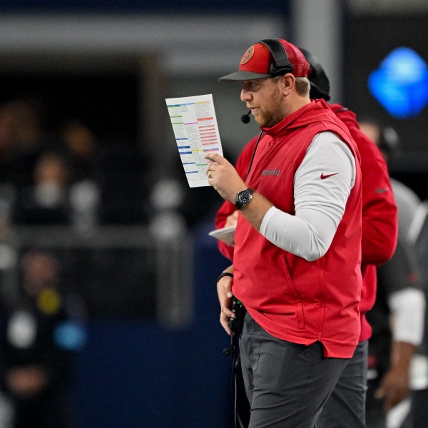 FILE - Tampa Bay Buccaneers offensive coordinator Liam Coen looks on from the sidelines during an NFL football game against the Dallas Cowboys in Arlington, Texas, Dec. 22, 2024. (AP Photo/Jerome Miron, File)