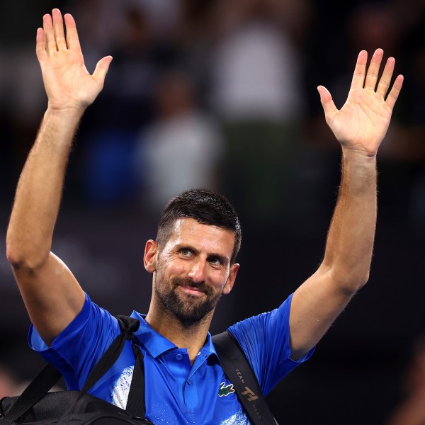 Serbia's Novak Djokovic reacts after losing his match against USA's Reilly Opelka at the Brisbane International, in Brisbane, Australia, Friday, Jan. 3, 2025. (AP Photo/Pat Hoelscher)