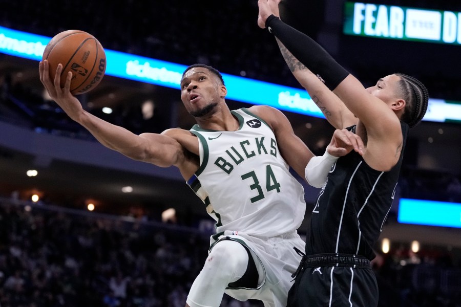 Milwaukee Bucks' Giannis Antetokounmpo shoots past Brooklyn Nets' Jalen Wilson during the second half of an NBA basketball game Thursday, Jan. 2, 2025, in Milwaukee. (AP Photo/Morry Gash)